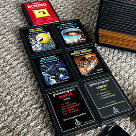 Atari 2600 light sixer w/ space invaders, pac-man, asteroids, boxing and more