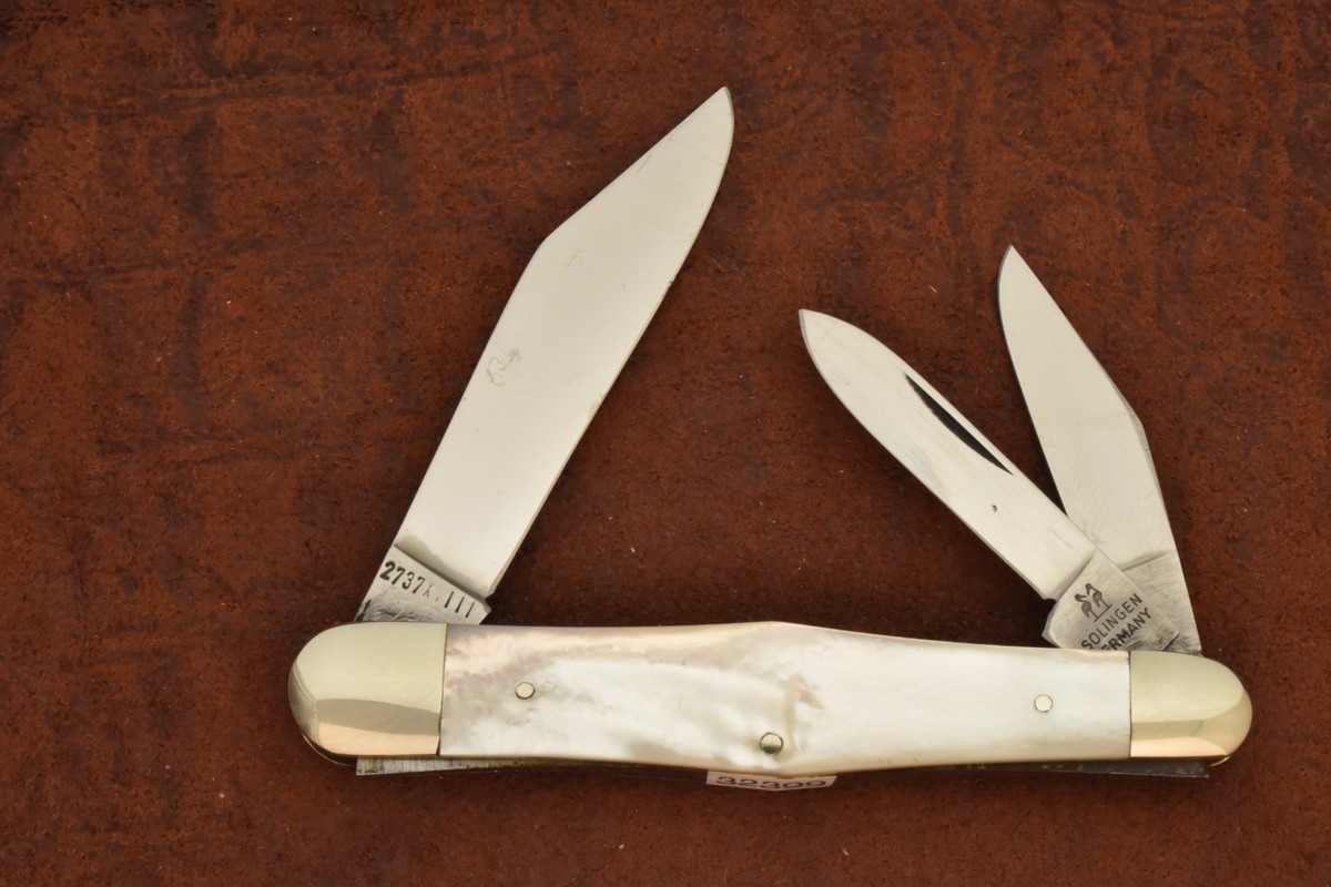 VINTAGE KISSING CRANE SOLINGEN GERMANY MOTHER OF PEARL WHITTLER