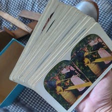 Antique Wooden Stereoscope Viewer with about 60 Card Slides/ broken for parts.