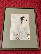 Kitagawa Utamaro woodblock print "Flirtatious Woman" framed under glass