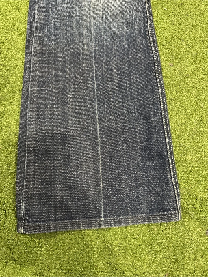 Pantalones de mezclilla lavado oscuro 7 For All Mankind para mujer talla 27 tiro bajo corte bootcut Foto 2 de 4