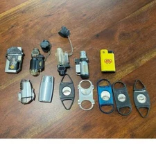 Lot of Lighters and Cigar Cutters (seven lighters and five cigar cutters)