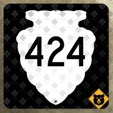 Montana secondary highway 424 road sign arrowhead Kalispell Whitefish 16x16