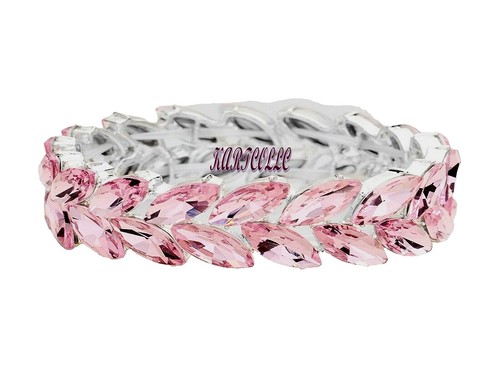 Pink Cuff Bracelet Watch with Silver Tone Accents and Unique 