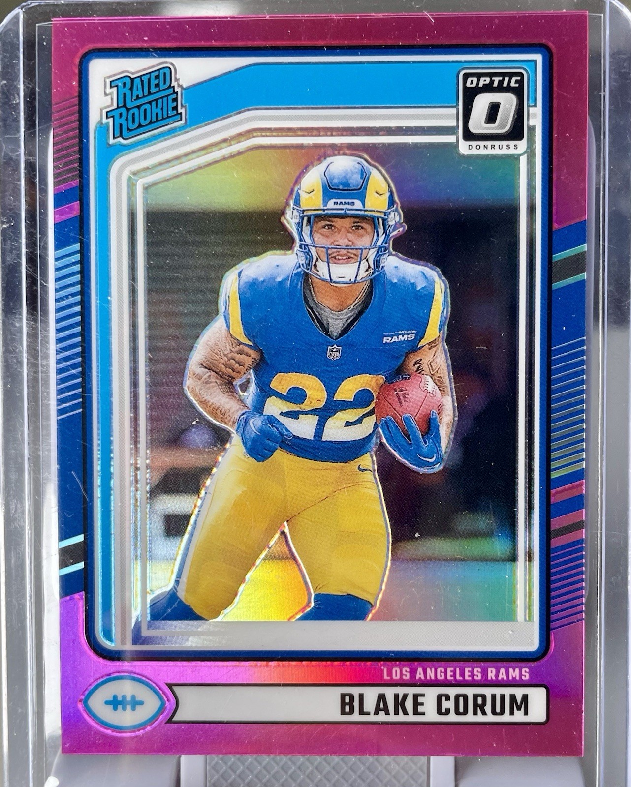 2024 Panini Donruss Rated Rookie Blake Corum #322 Optic Preview Pink Prizm (RC)