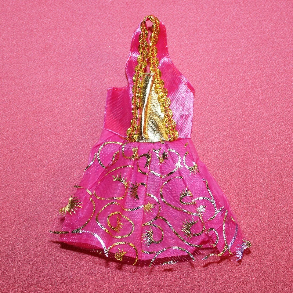 Robe rose et dorée pour poupée Barbie Mattel - Photo 1/1