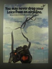 1985 Leica R4 Camera Ad - May Never Drop From an Airplane