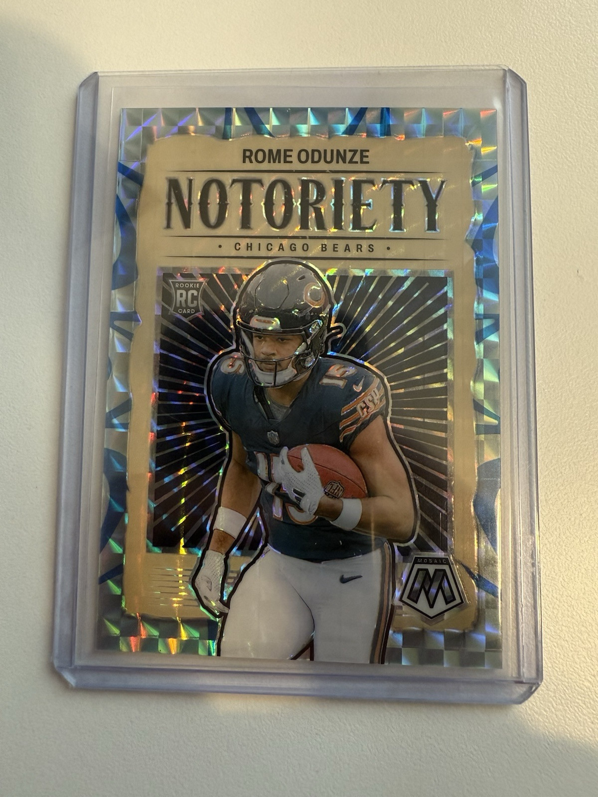 2024 Mosaic Rome Odunze  Notoriety Reactive Blue /99 No. 24 Chicago Bears