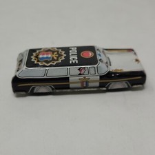 Vintage Tin Metal police car. Not Friction Free Rolling Japan