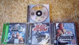 PlayStation 1 console with games