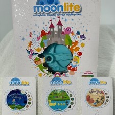 Moonlite Storytime Projector And 5 Reels Very Good Condition Used.