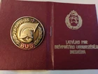 Latvian SSR. Volunteer firefighter member badge with a document.