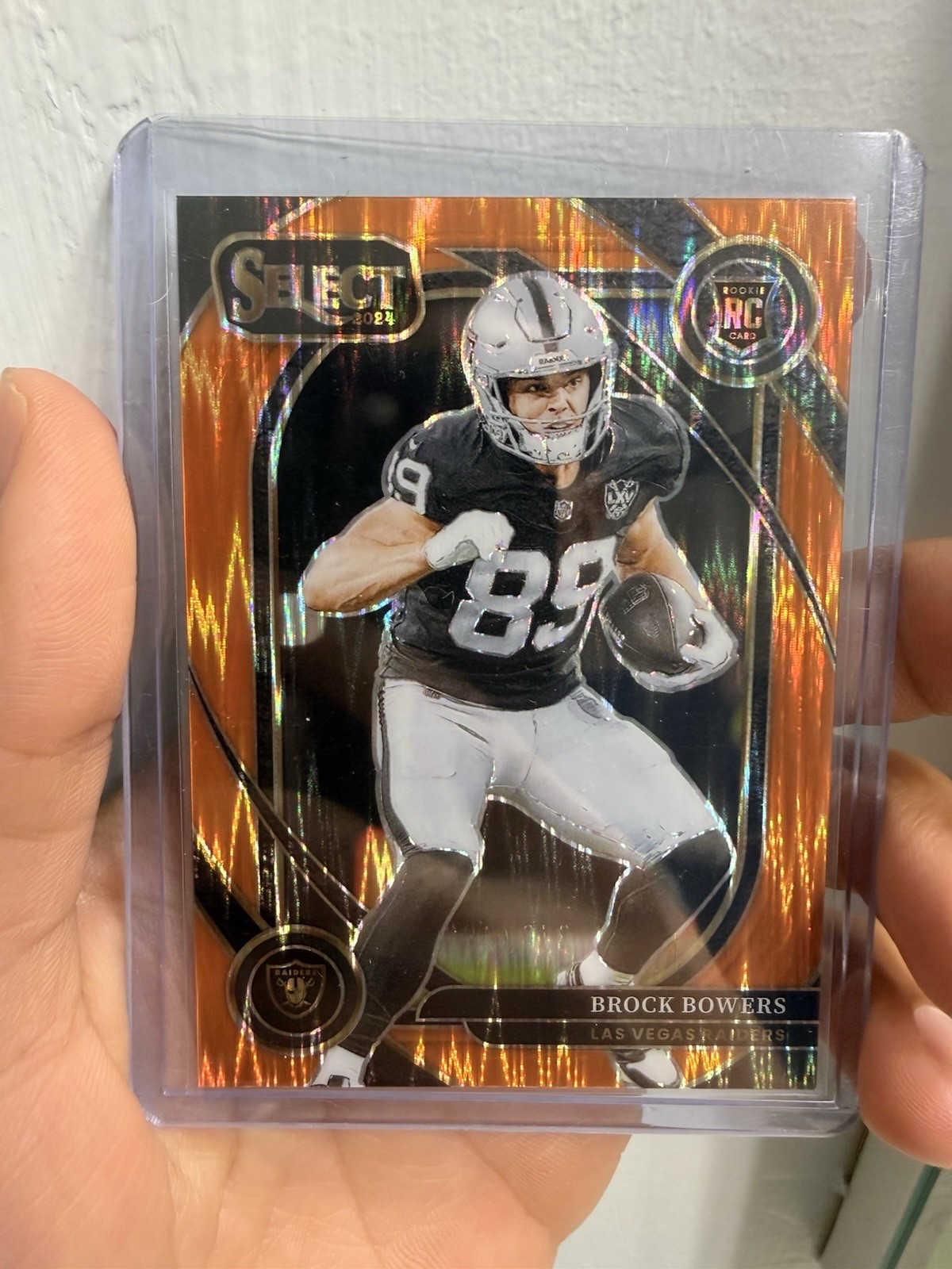 2024 Panini Select - Club Level Brock Bowers #222 Orange Shock Prizm /399 (RC)