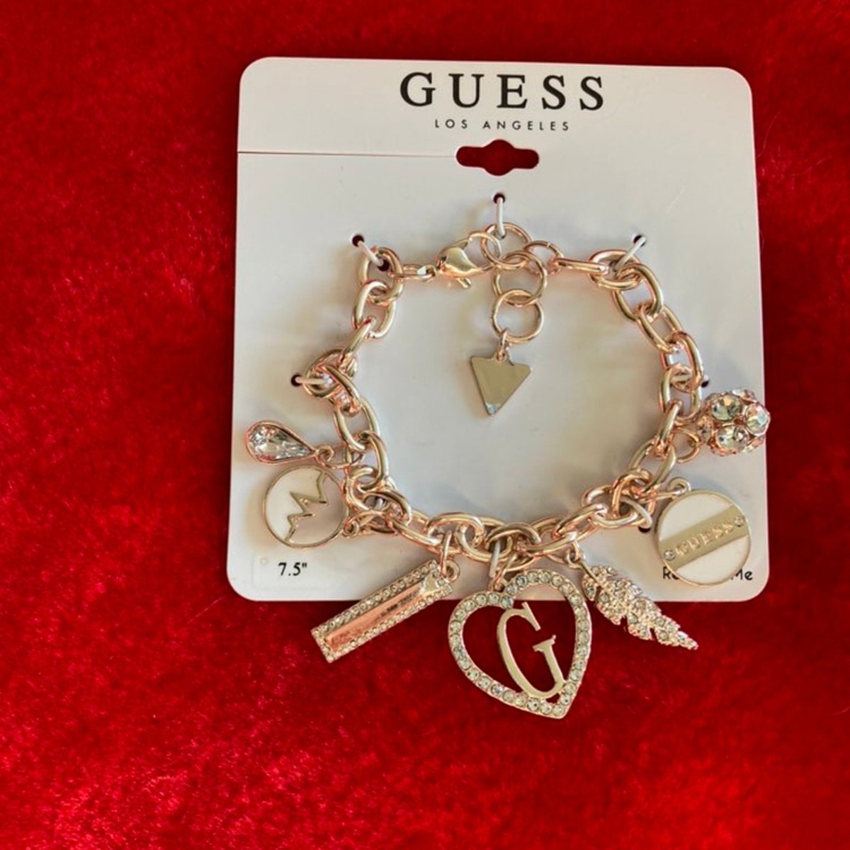 Brand NEW Guess Charm and Dangle Bracelet Rose Tone Gold | eBay