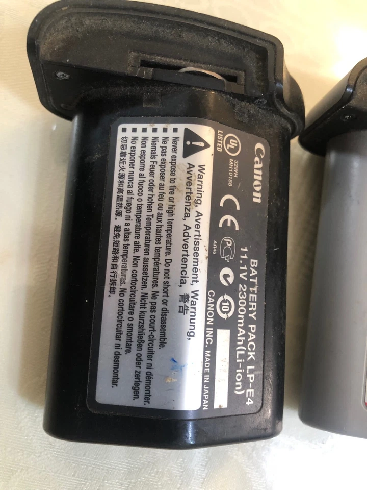 Paquete de 2 baterías Canon LP-E19 para EOS-1DX Mark II sin probar como están las piezas Foto 3 de 4