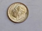 1946-d uncirculated silver Roosevelt dime. Some tonning.