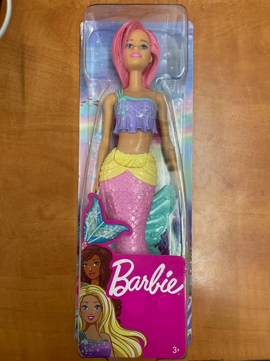 Barbie Dreamtopia poupée sirène cheveux roses et tenue multicolore.