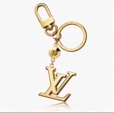 Louis Vuitton Porte Cles LV Facettes Gold Bag Charm Key Holder M65216