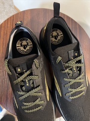 black and gold brooks shoes
