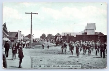 Bronson, Kansas Street Scene, Marching Band, American Flag, 1908 Postcard