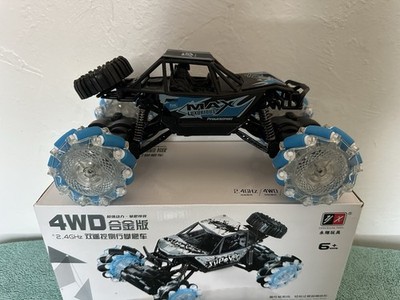 Blue MONSTER TRUCK  360 Degrees Turns LED Light Up Tires Stunt Truck FAST!!!