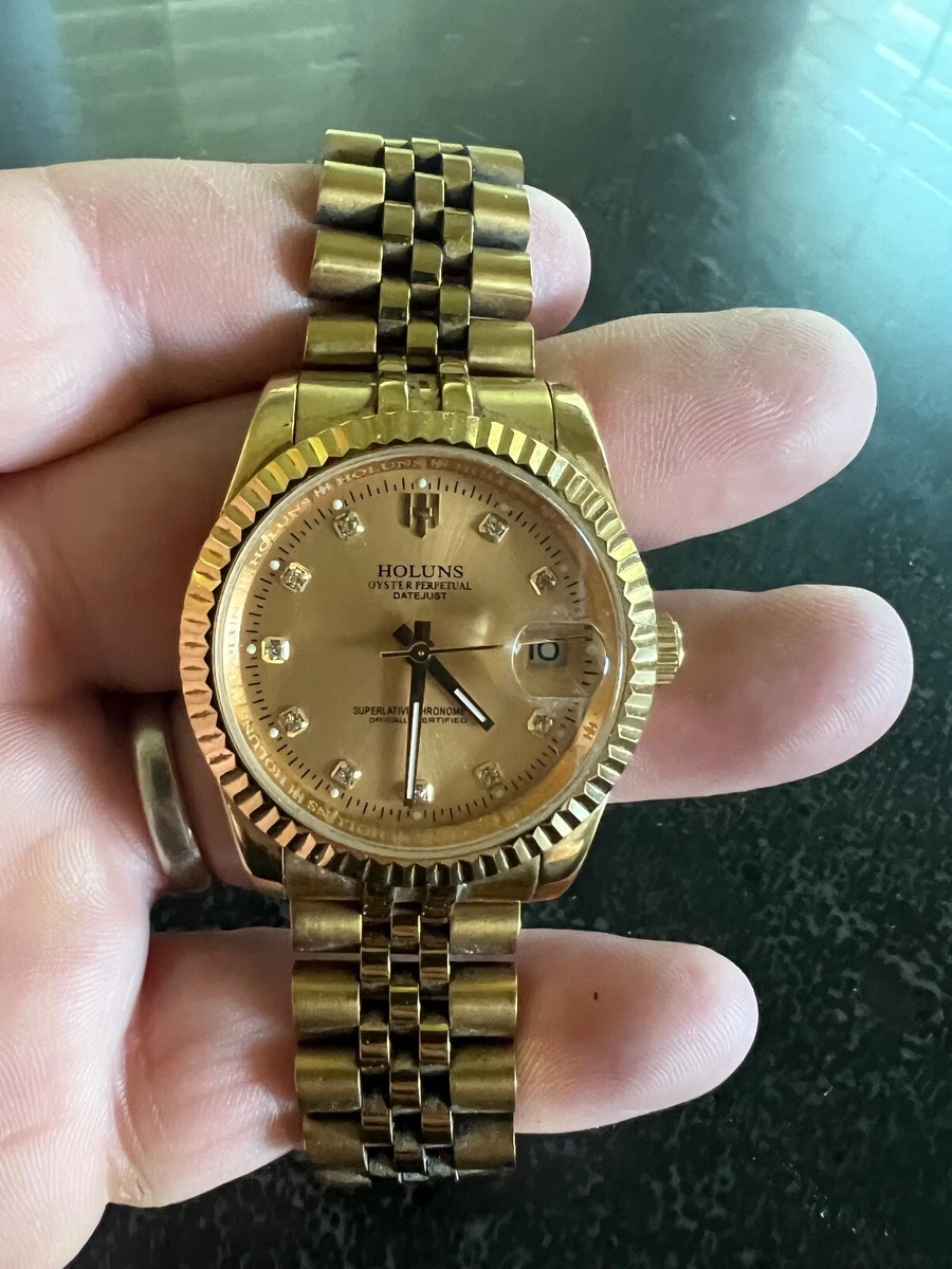 Holuns Gold Toned Automatic watch. eBay