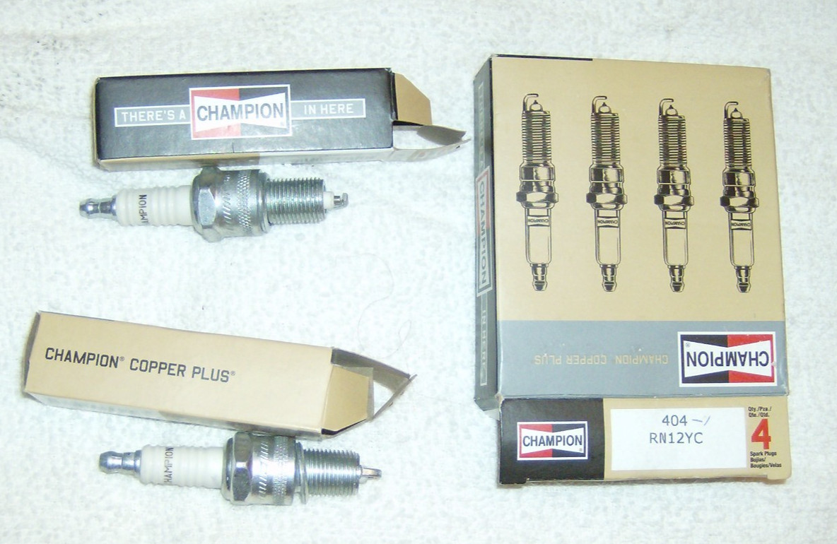 TWO CHAMPION NOS-NEW SPARK PLUGS 404/RN12YC