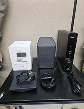 Xfinity internet and TV set up including 2 towers TV box and camera