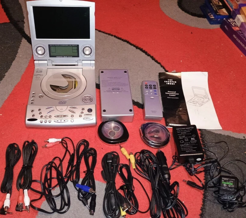 Sharper Image Entertainment System SI655 TV DVD MP3 CD Radio Alarm
