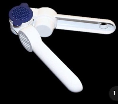Tupperware Steel garlic press white And blue  Includes cleaning tool