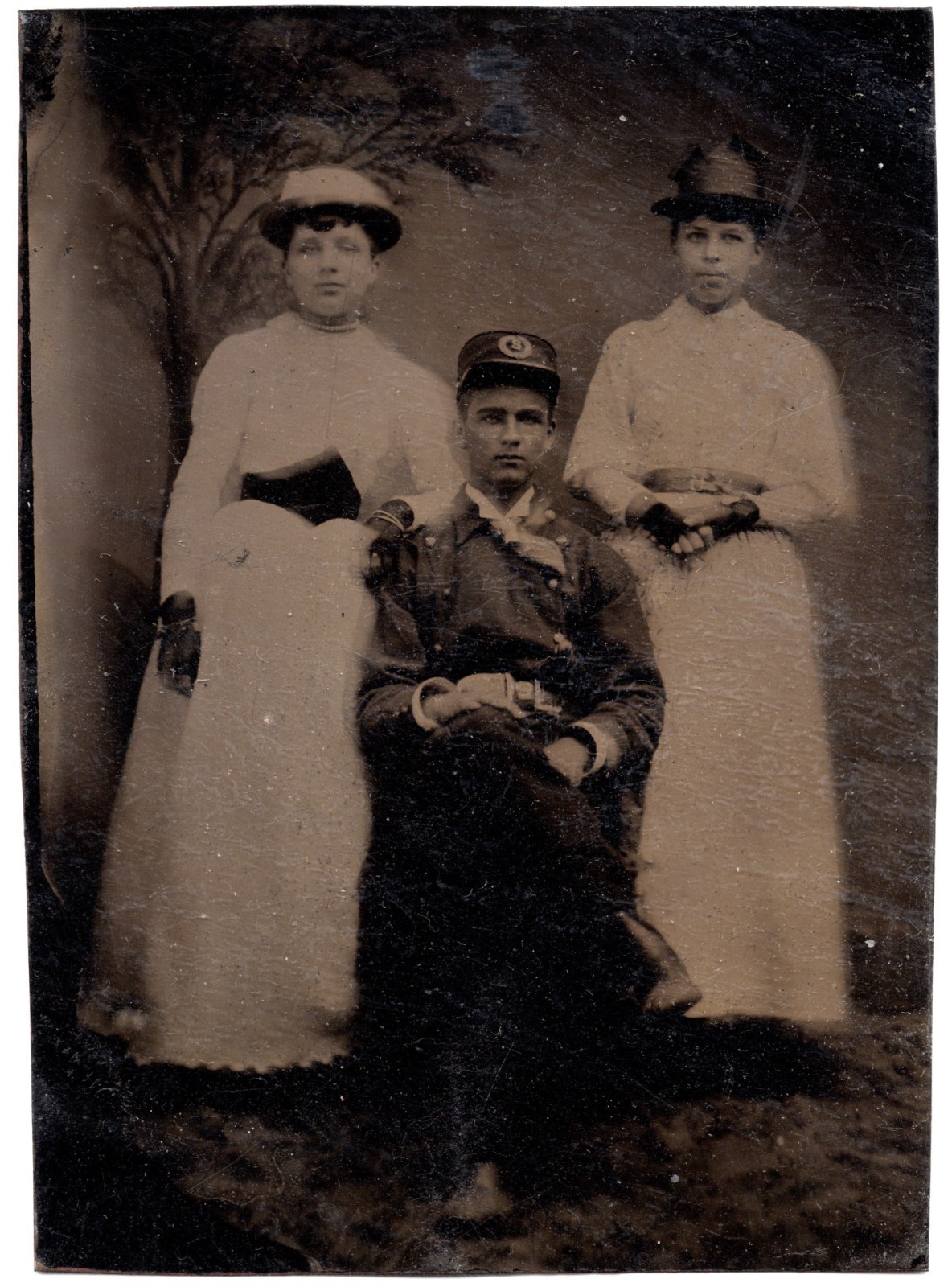 1/6th Plate Tintype Fireman in Uniform with Two Ladies in White Dresses