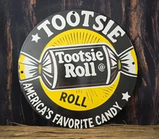 VINTAGE 1950'S TOOTSIE ROLL CANDY PORCELAIN SIGN AMERICA'S FAVORITE CANDY 12".
