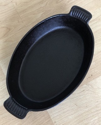 Vintage Cast Iron Oval Casserole Bake Dish With Patterned Handles 8  X 11  X 2 