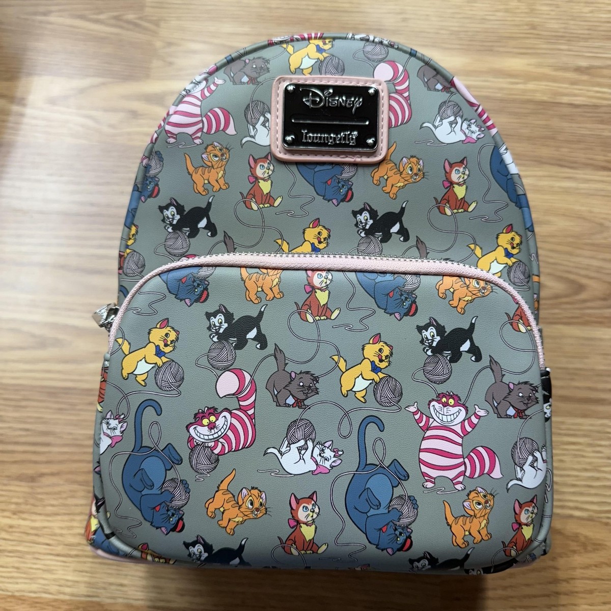 disney cats loungefly mini backpack x Women's Handbag & Zip Around Wallet Set Disney designers have gone to the dogs (and cats) for inspiration with this mini backpack by Loungefly New! Pre-order: Loungefly Disney Cats