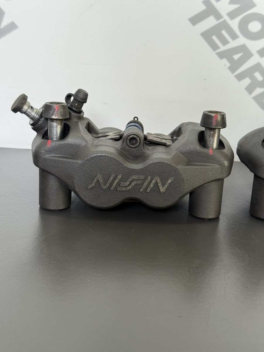 TRIUMPH STREET TRIPLE 675R 675 FRONT BRAKE CALIPER SET NISSIN