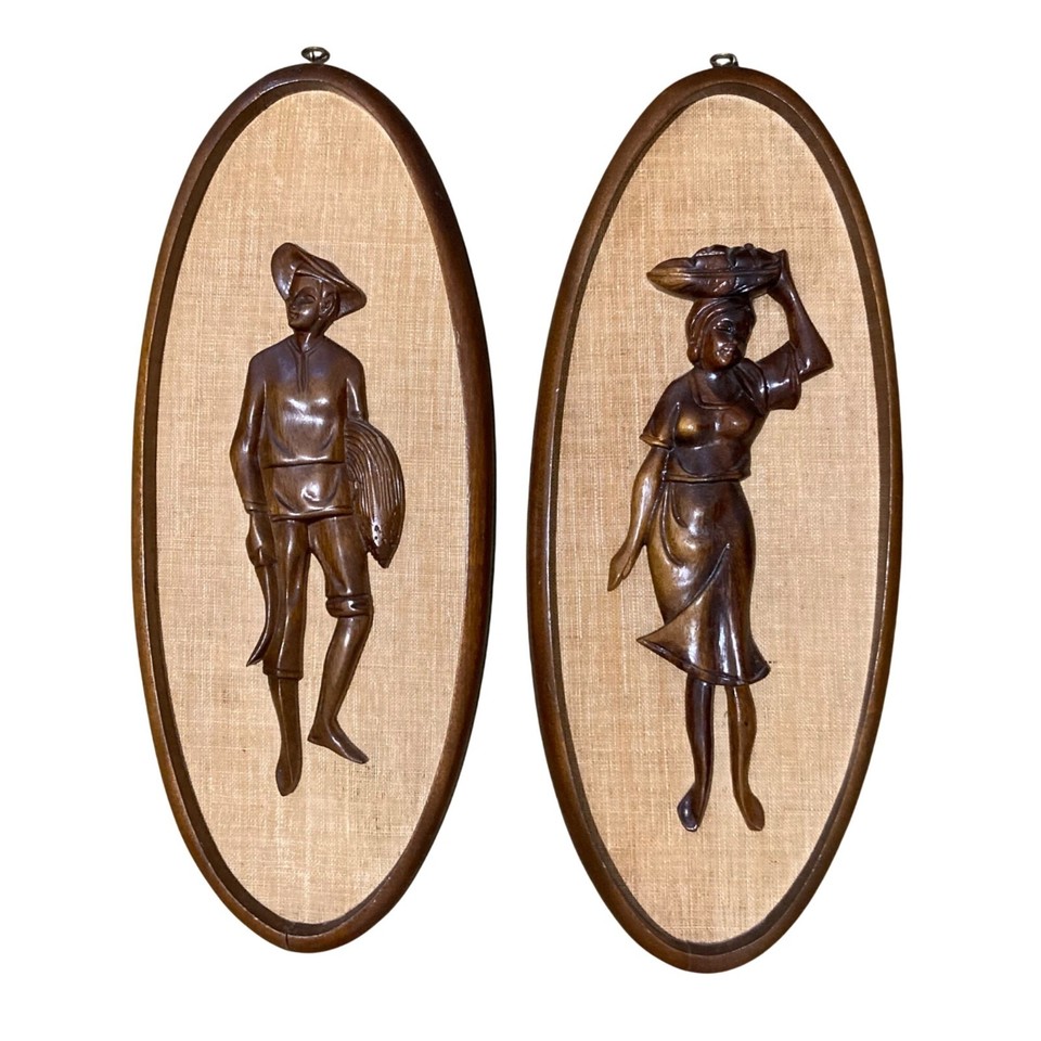 A matched set of vintage teak MCM wall panels — warm, sculptural, and genuinely from the era that invented the look, at a price that beats any reproduction.