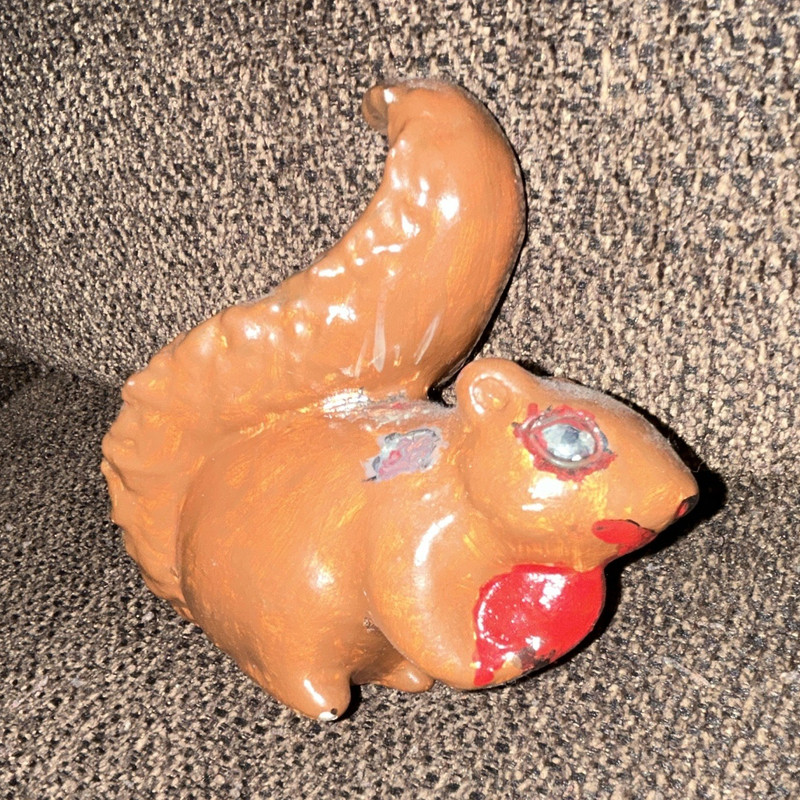 hand-painted squirrel figurine with a dark, horror-inspired look