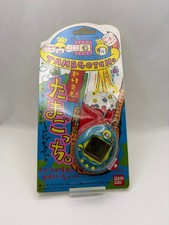Tamagotchi Gen 2 1997 - Blue with Logo - Japanese V1 Programming - Bandai, New
