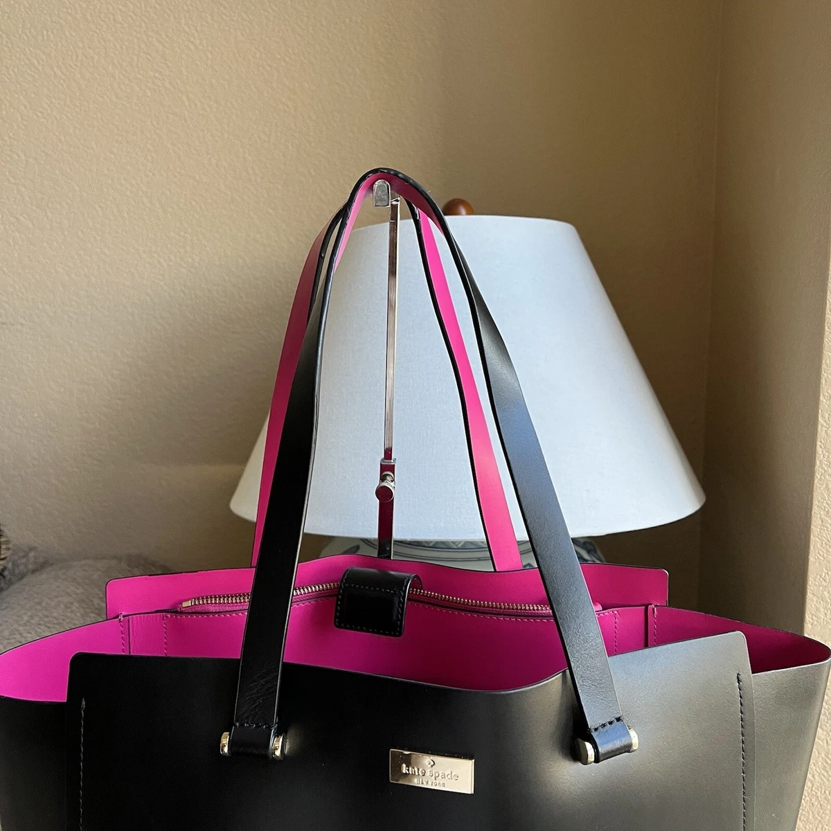Kate spade black purse pink inside sale