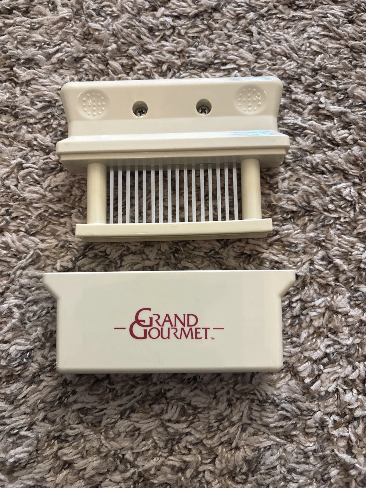 Grand Gourmet brand meat tenderizer