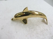 One brass sea solphin one brass shell two heart votive candle holder