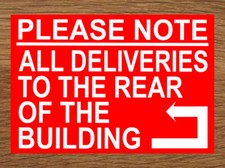 ALL DELIVERIES TO REAR OF THE BUILDING - SIGN NOTICE goods in out door couriers