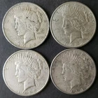 1922, 1923 S, 1923 S, and 1925 $1 Peace Silver Dollars