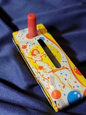 Vintage Party Girl - Trumpet Man NOISE MAKER Metal Toy
