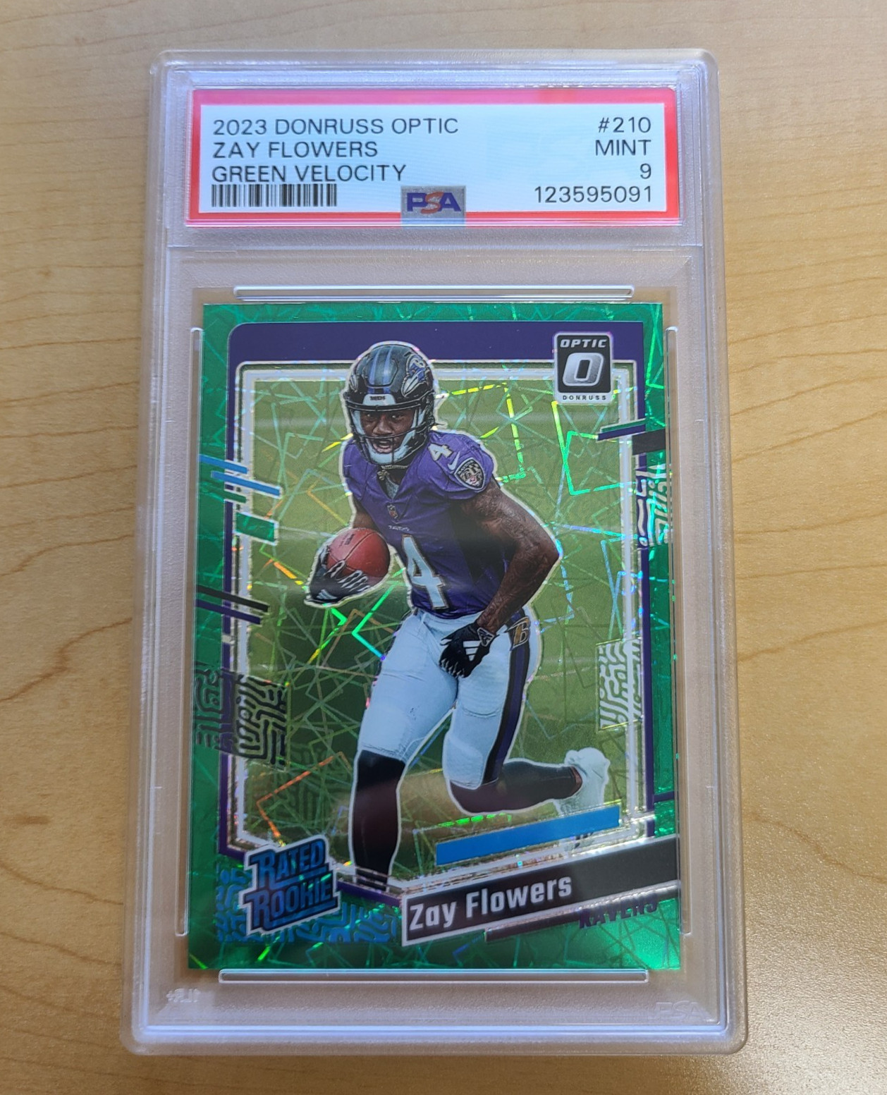 2023 Panini Donruss Optic Zay Flowers Green Velocity Rated Rookie #210 PSA 9