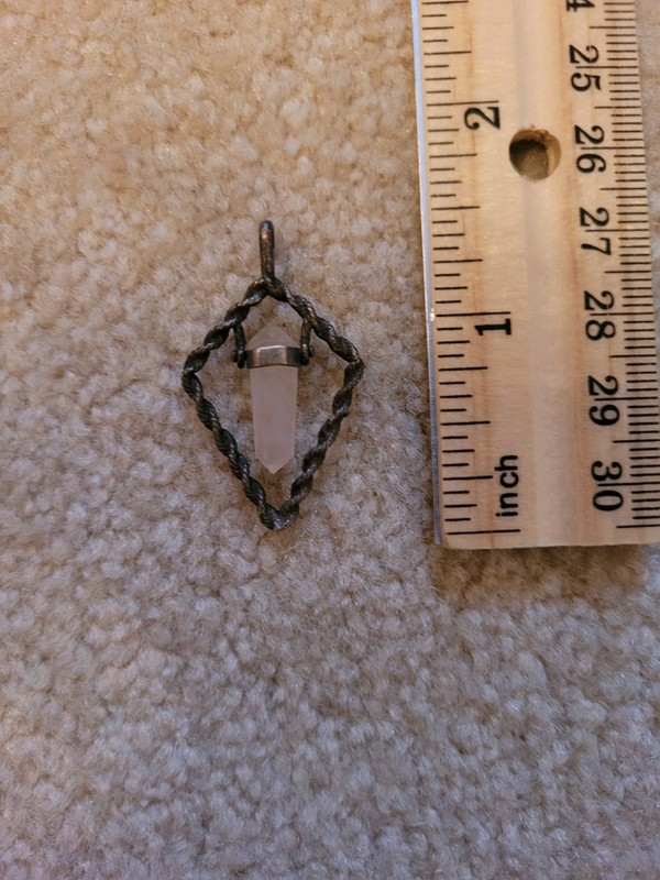 Rose Quartz Hexagonal Point Cut Crystal In A Twisted Metal Wire Pendant