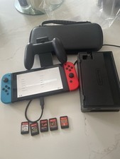 Nintendo Switch In Very Good Condition. Comes With 5 Games And Accessories