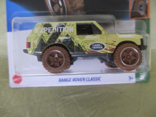 HOT WHEELS Range Rover LandROVER yellow camo mud NIP camo tough truck - Picture 2 of 2