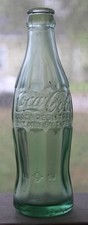 Coca Cola foreign embossed hobbleskirt Coke soda bottle from CUBA dated 1953
