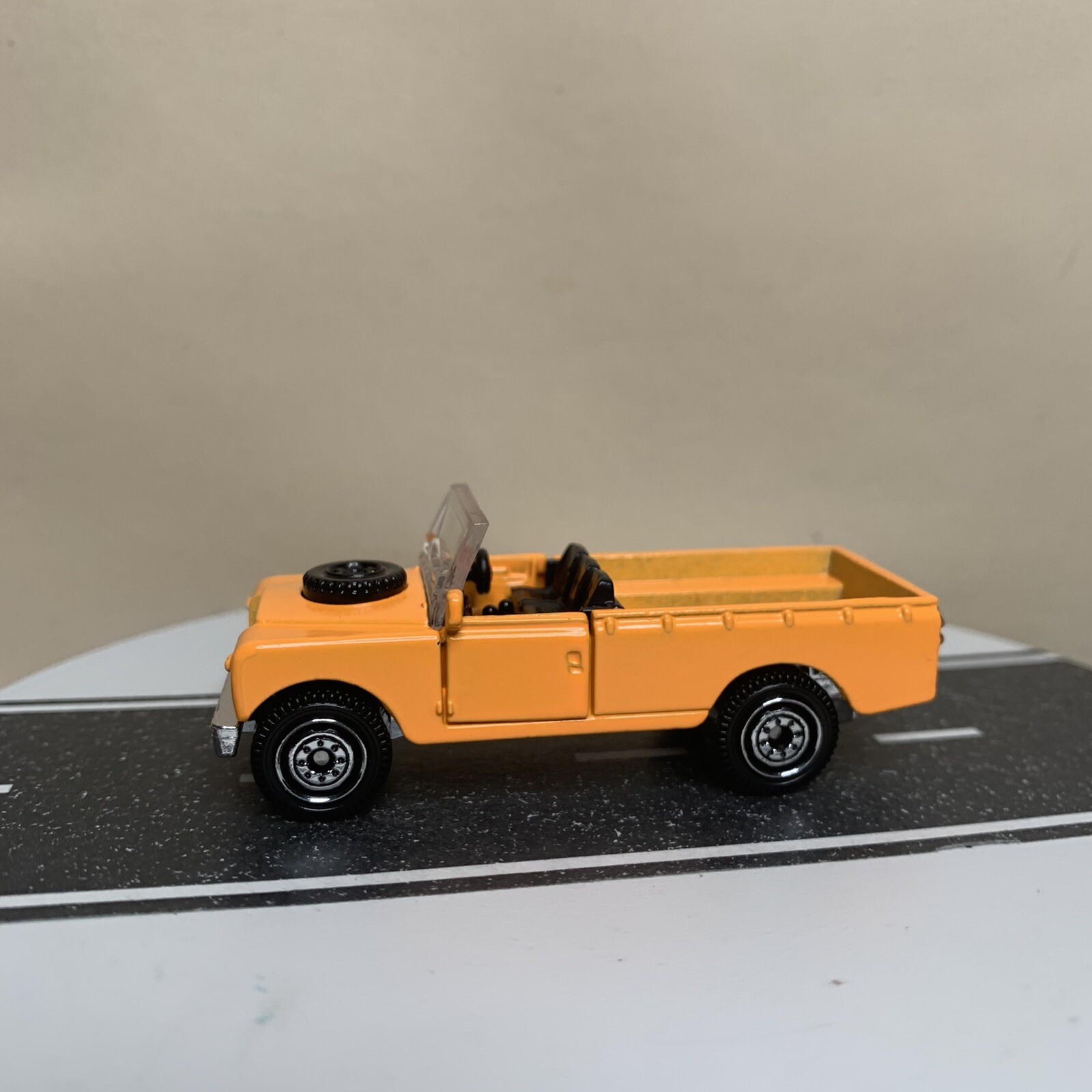 2023 Matchbox Moving Parts 1965 Land Rover II Pickup Truck Open Top Orange 1:64